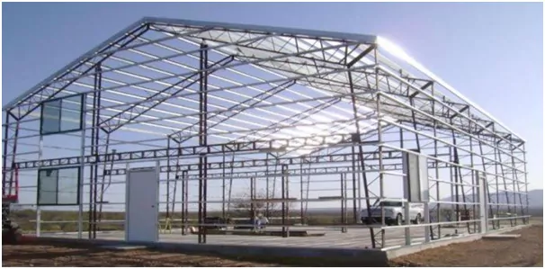 Completed small pre-engineered steel building with partial cladding